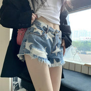 women's star print raw edge denim shorts - MRSLM