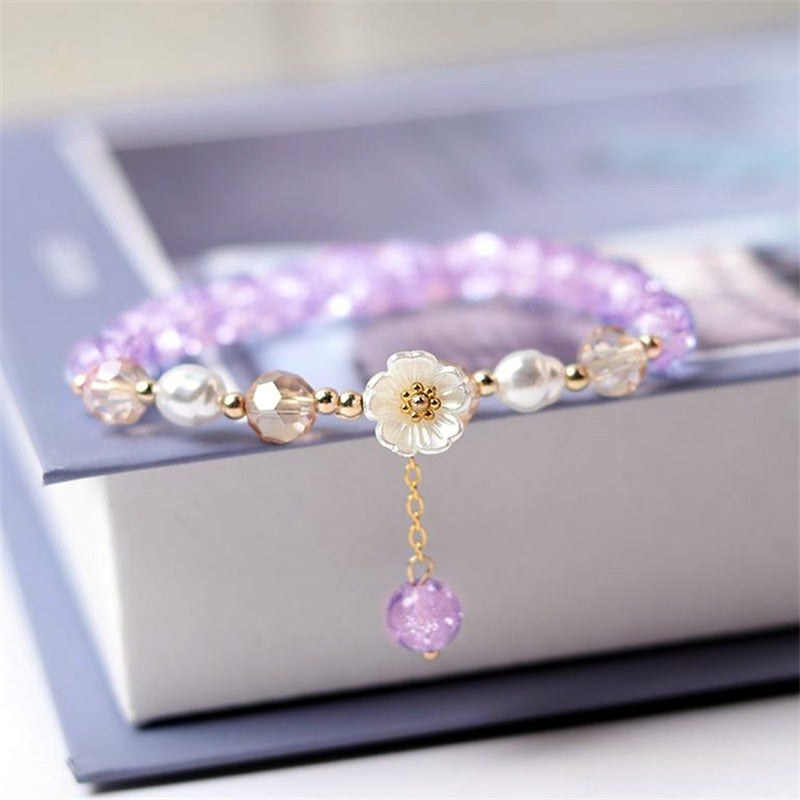 Elegant Purple Beaded White Flower Bracelet