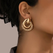 gold metal twist dangle earrings, view 3 - MRSLM