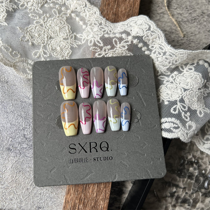 hand-worn flower nails, view 8 - MRSLM