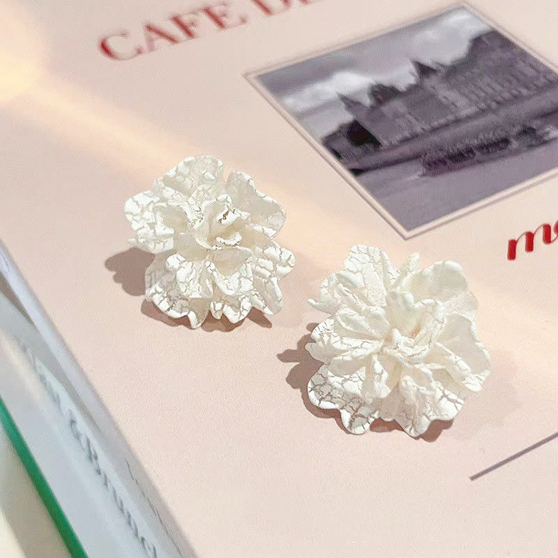 white floral stud earrings, view 5 - MRSLM