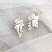 white ceramic flower ear hook earrings, view 4 - MRSLM