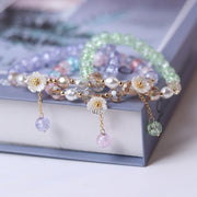 purple beaded white flower bracelet, view 9 - MRSLM