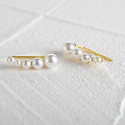 single row pearl stud earrings, view 4 - MRSLM
