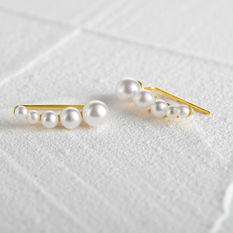single row pearl stud earrings, view 4 - MRSLM