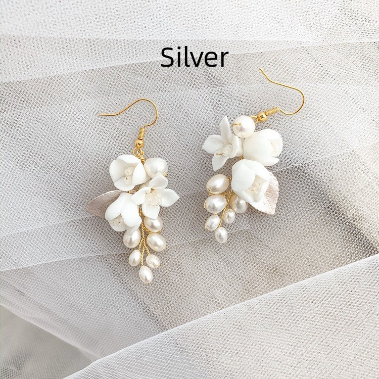 white ceramic flower ear hook earrings, view 5 - MRSLM