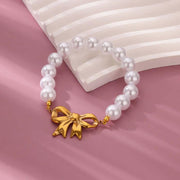 gold bowknot bracelet with imitation pearls - MRSLM