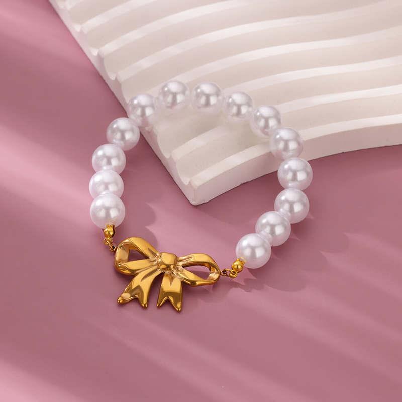 gold bowknot bracelet with imitation pearls - MRSLM