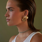 Gold-plated spiral conch earrings - MRSLM