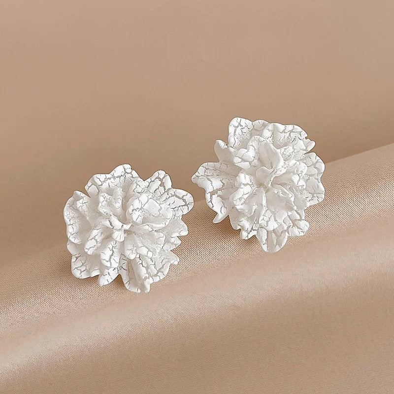 white floral stud earrings, view 2 - MRSLM