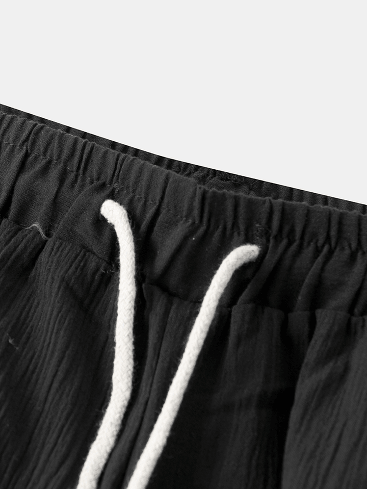 Men Loose Drawstring Pocket Black Casual Pants - MRSLM