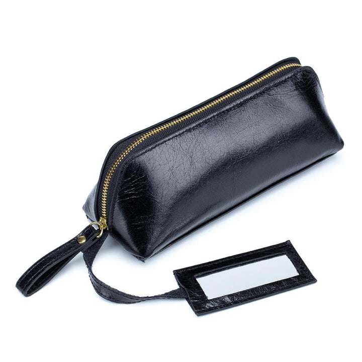 Portable female hand holding cosmetic bag - MRSLM