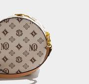 women's small round PU crossbody bag, view 4 - MRSLM